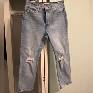 New Without Tags. Levi Wedgie Straight Distressed light wash
